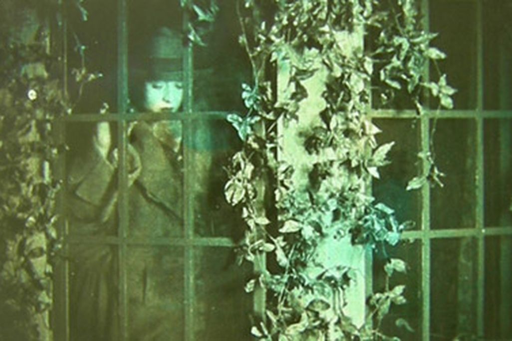 It's tempting to find hints of Hitchcock's future style in the set design and lighting for The White Shadow.