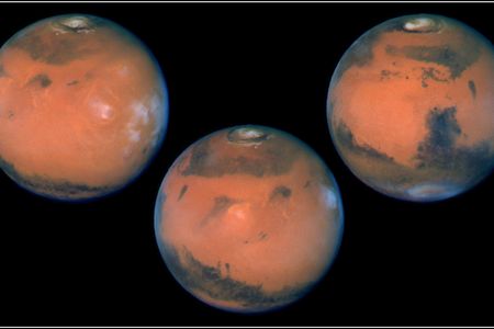 These images show the planet on the last day of Martian spring in the northern hemisphere (just before summer solstice). The annual north polar carbon dioxide frost (dry ice) cap is rapidly sublimating, revealing the much smaller permanent water ice cap.