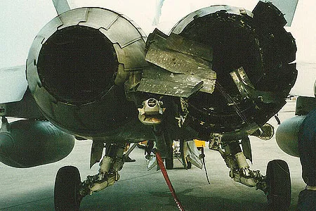 The starboard engine on the author’s F/A-18D takes licking, keeps ticking after a February 21, 1991 Iraqi missile strike.