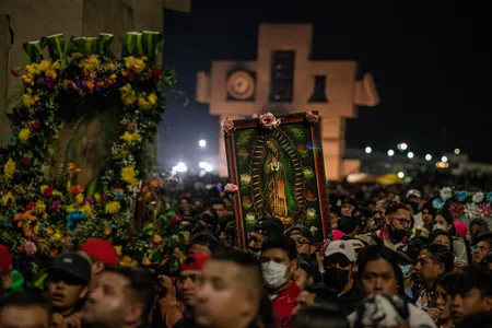 Pilgrims queue to get inside of the Basilica of Guadalupe on December 11, 2022.