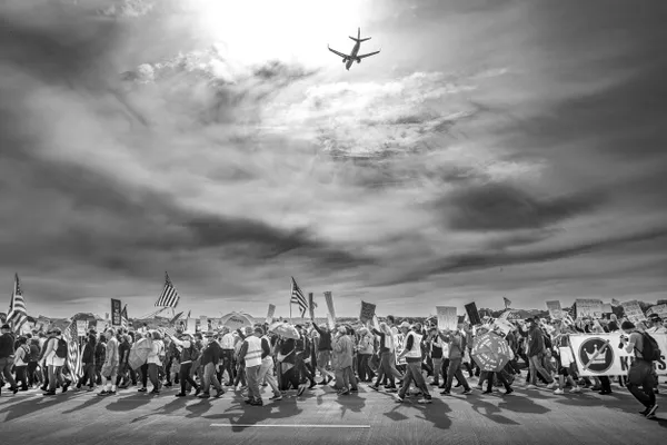 Protestors and Plane thumbnail
