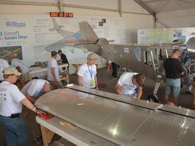 Volunteers lined up to be one of thousands to help put a Zenith kit together in one week at AirVenture this year.