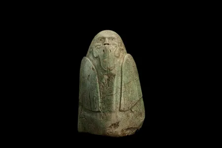 The Tuxtla statuette, discovered in Veracruz, Mexico, in 1902, now resides in the National Museum of Natural History.

