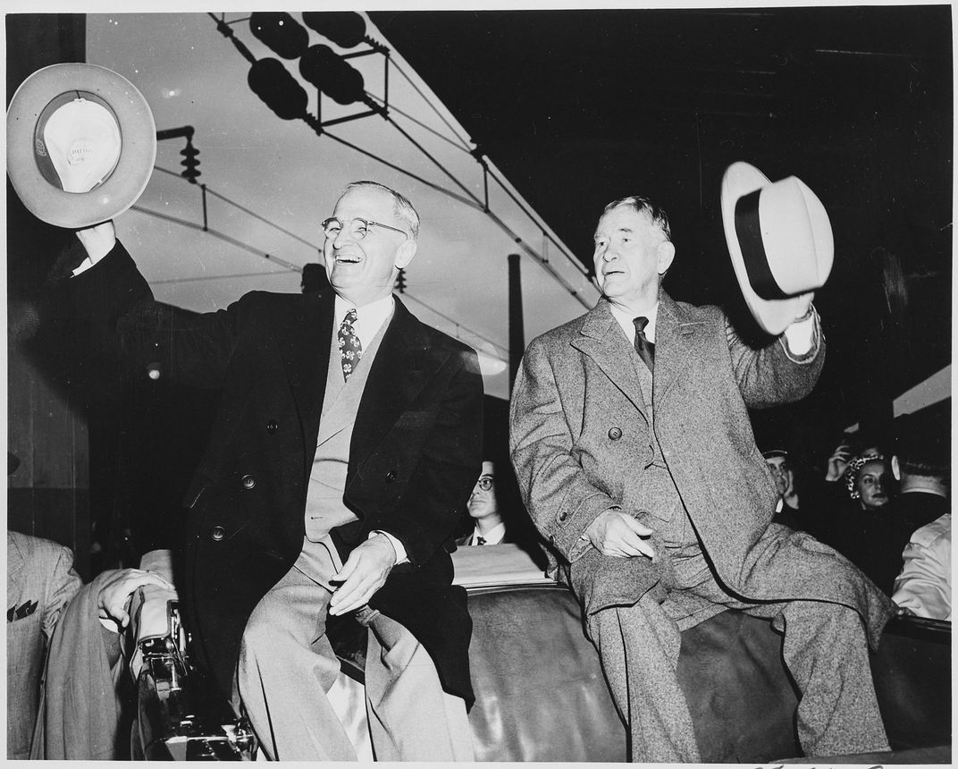 President Harry S. Truman and Vice President-Elect Alben Barkley celebrate their victory in the 1948 election.