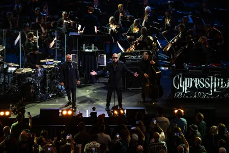 Cypress Hill&#39;s&nbsp;Sen Dog and B-Real&nbsp;perform with the London Symphony Orchestra at the Royal Albert Hall in London.