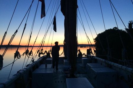Dawn at the dock at Piscataway, with the many mast stays outlined by the morning light.