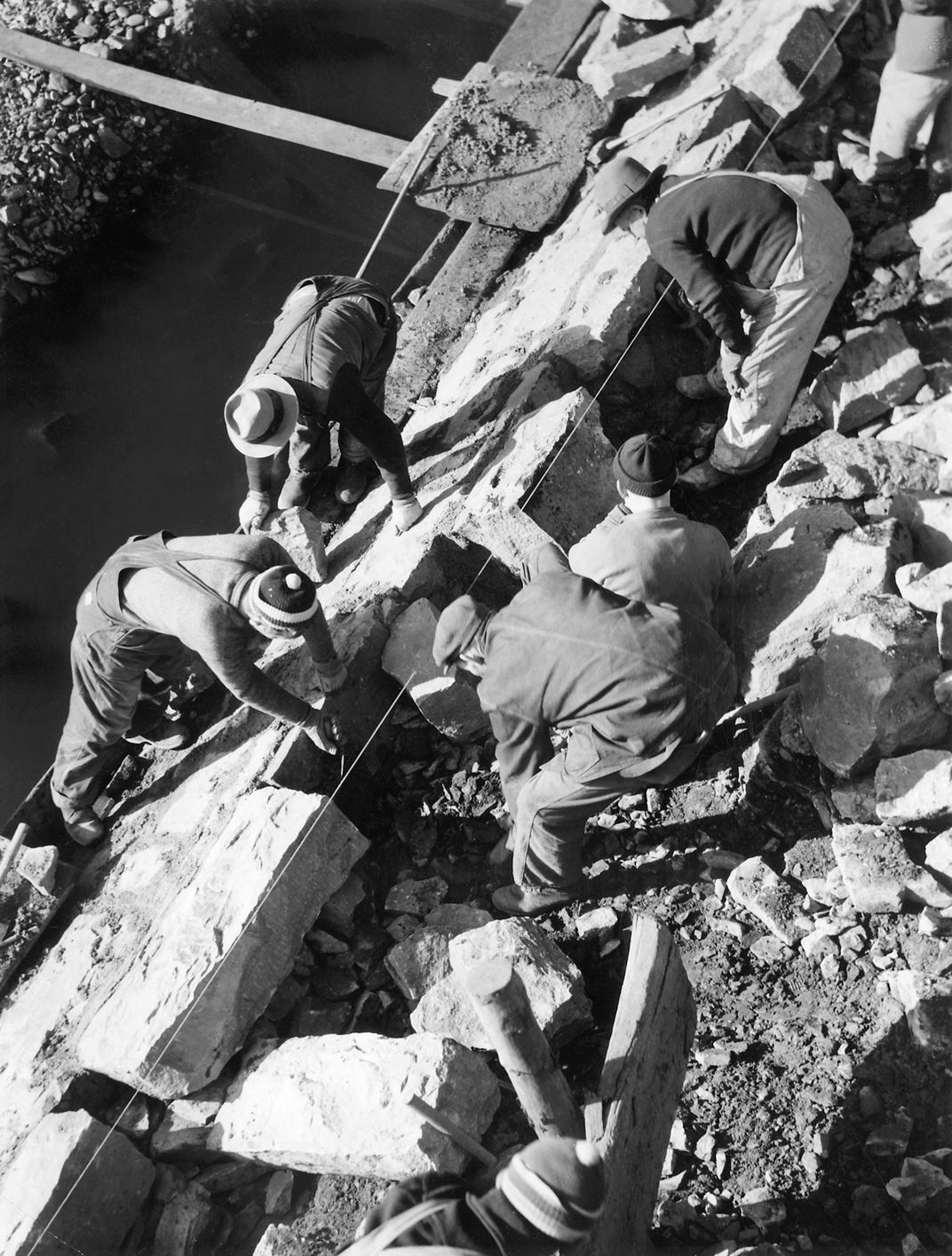 Works Progress Administration workers assist with road development.