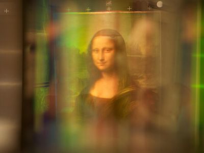 A scientist says a multispectral analysis of the Mona Lisa shows hidden portraits beneath the famous painting.
