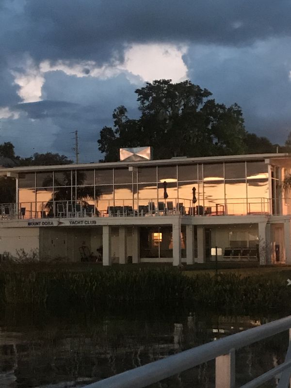 The sunset on a cozy old yacht club in central Florida... Mount Dora, Florida. thumbnail