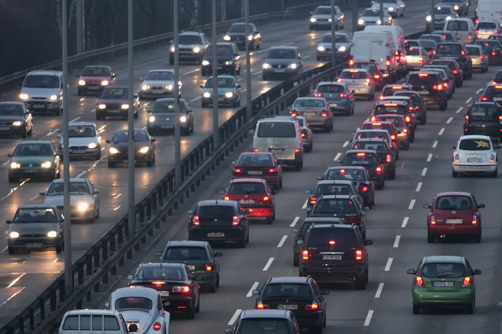 Car traffic on a road at night