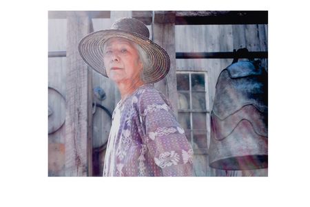 Photograph of Toshiko Takaezu posing with work (detail), September 2004. Toshiko Takaezu papers, 1937-2010. Archives of American Art, Smithsonian Institution.