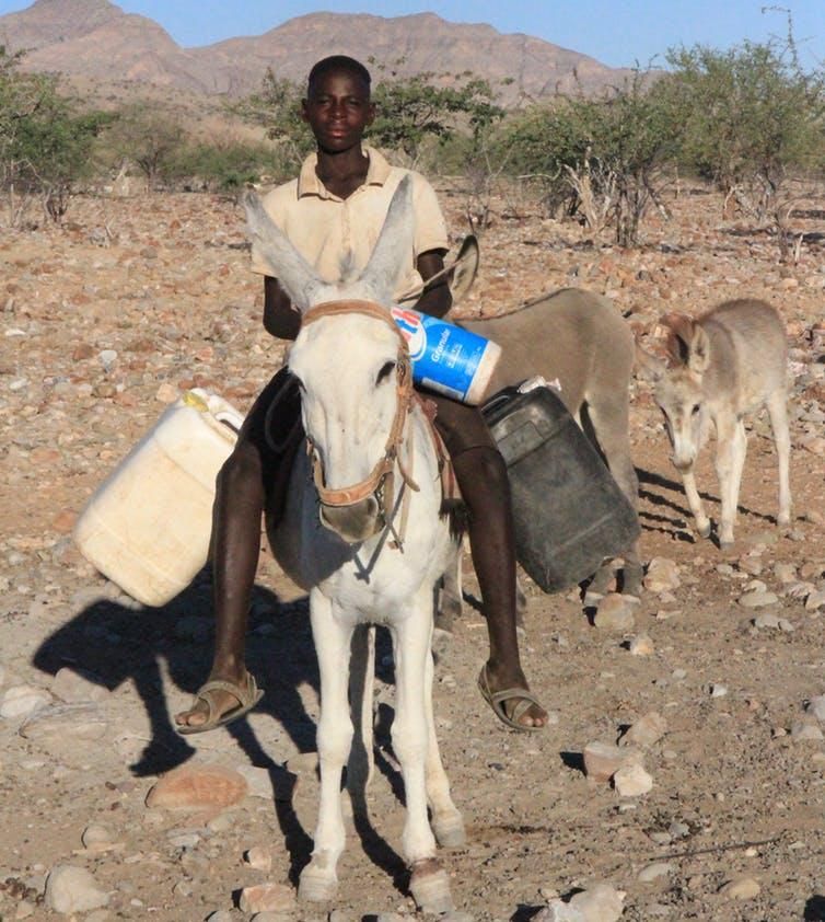 Water can be hard to access in rural areas. This young Namibian travels two miles round-trip every day to collect water for drinking, cooking and cleaning.