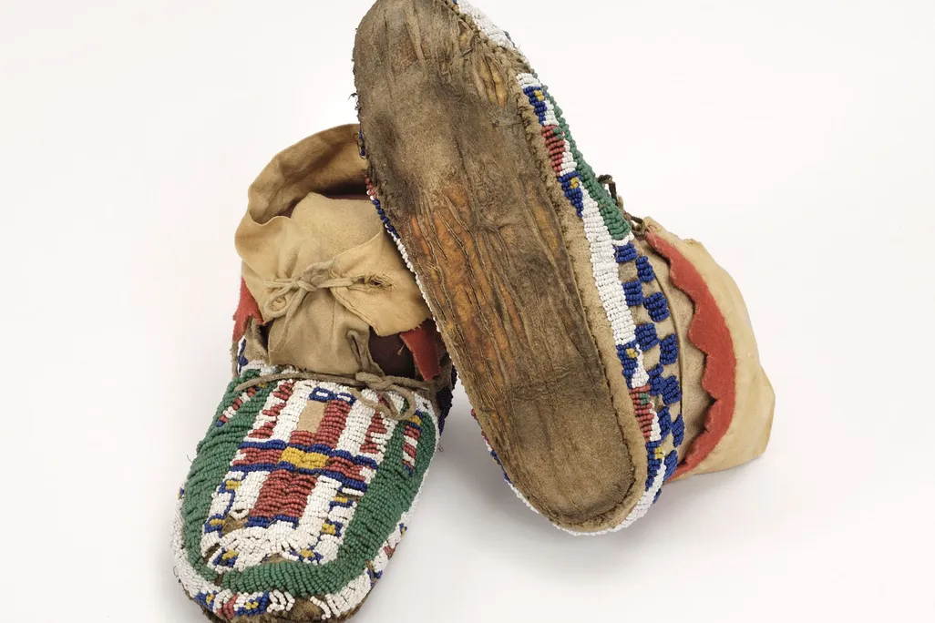 A brightly colored and decorated pair of Moccasins