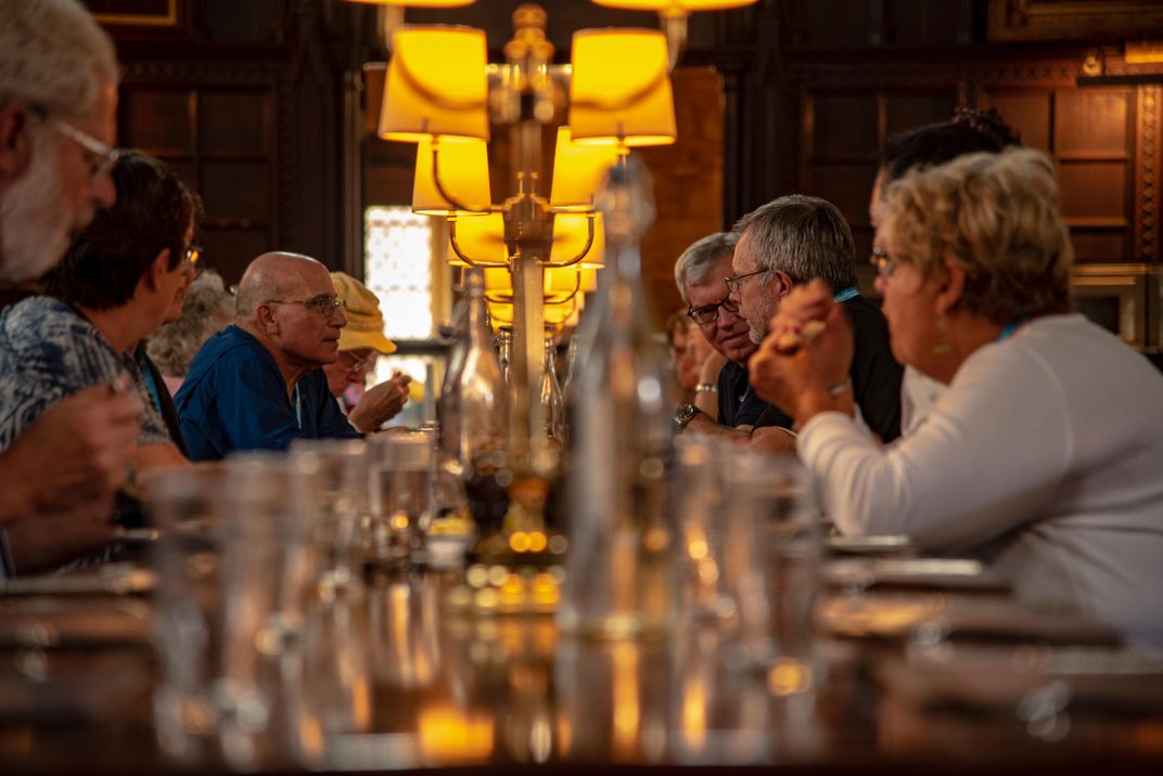 Conversation over dinner. Credit: Wade Jennings