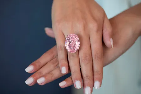 Even the strongest hands might get tired wearing a 59.6-carat pink diamond.