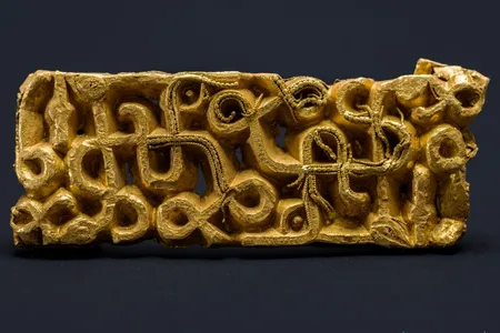 The golden artifact, a sword scabbard fitting perhaps belonging to an elite warrior leader&nbsp;