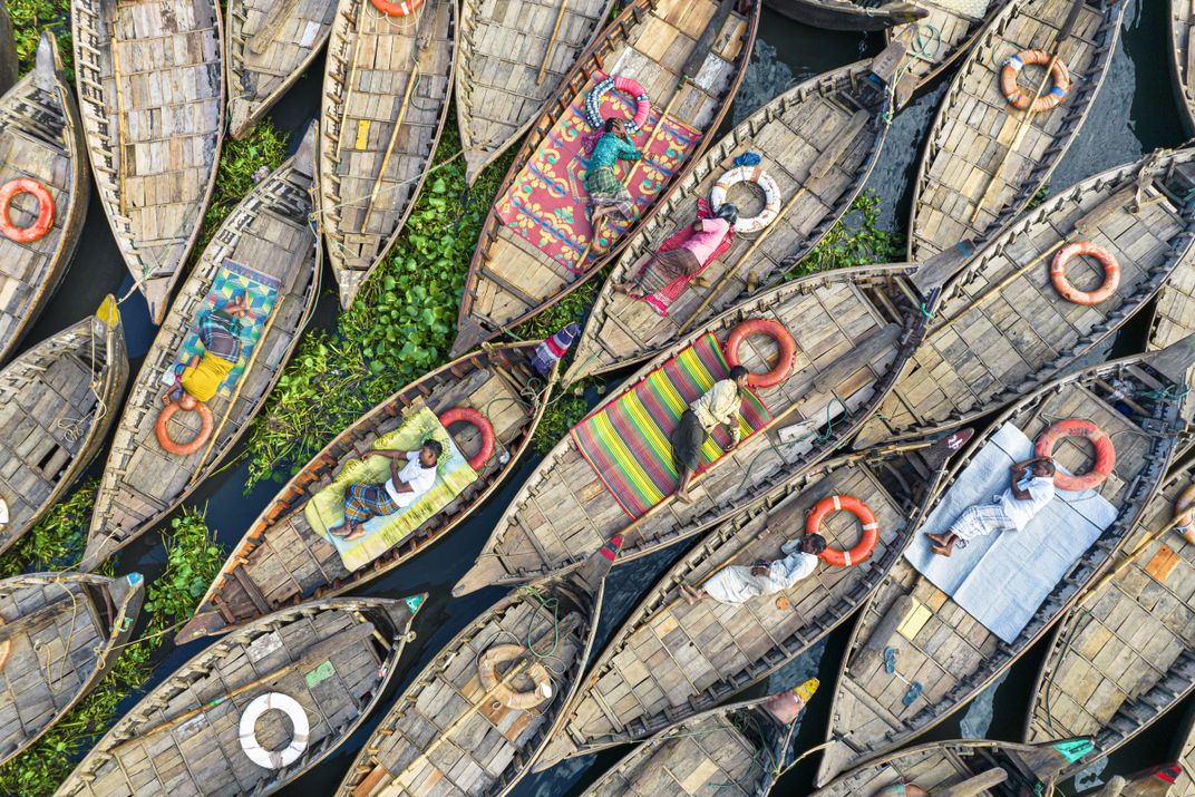 Boatmen sleeping on their boats | Smithsonian Photo Contest ...