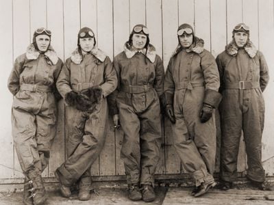 Airmail pilots (from left) Jack Knight, Harvey Lange, Lawrence Garrison, “Wild Bill” Hopson, and Andrew Dunphy pose for photographer Nathaniel Dewell in 1922.