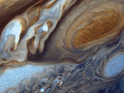Assembled and enhanced from three Voyager 1 negatives, this picture shows Jupiter’s swirling clouds and Great Red Spot.