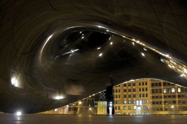 Mystery person under the Chicago Bean late at night. thumbnail