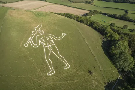 Researchers have long debated the Cerne Abbas Giant's age, with some dating it to the prehistoric period and others to the medieval era.