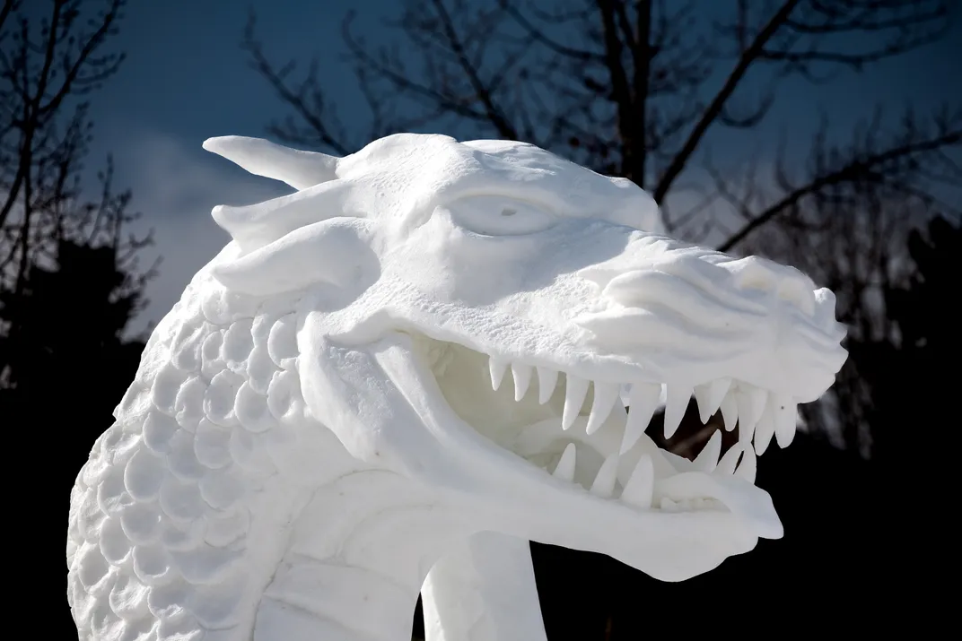 Snow sculpture of a dragon head