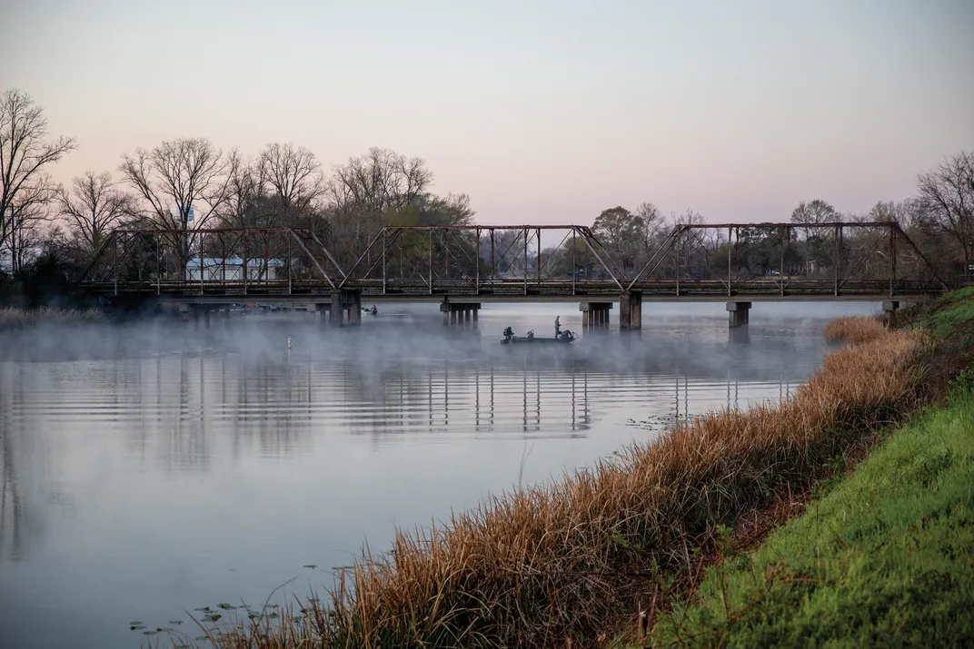 a river with a bridge