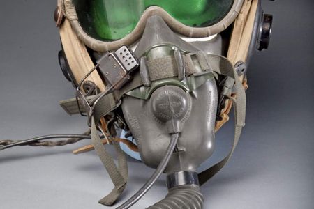 A Type A-13A oxygen mask and Polaroid goggles were worn with this helmet during many flights in 1944-1946. Made by Stefan A. Cavallo, a test pilot for the National Advisory Committee for Aeronautics (NACA).