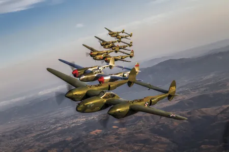 ★ Lockheed P-38 Lightning ★ Though no Luftwaffe pilot was ever happy to see the P-38 (they called it the “forked-tail devil”), the twin-engine, twin-boom fighter made its reputation in the Pacific, where pilots outfought Mitsubishi A6M Zeros. With speeds in excess of 400 mph, a range of 1,300 miles, and four M2 Browning .50s in its nose, the Lightning was a threat in any theater.