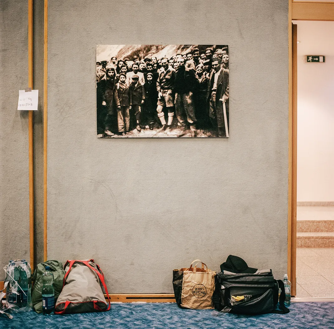 A photo of refugees and Bricha guides hangs at the elementary school where the APC hosts pre-hike presentations.