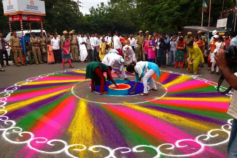 Indians design rangolis (designs with coloured powder) at festivals. As ...