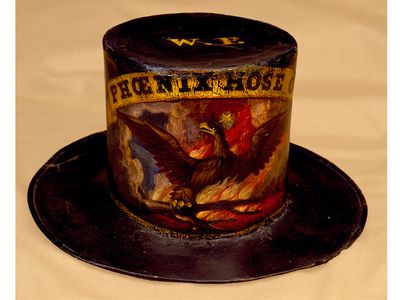 A fireman's hat dating to around 1860 was decorated for the Phoenix Hose Company of Philadelphia by David Bustill Bowser