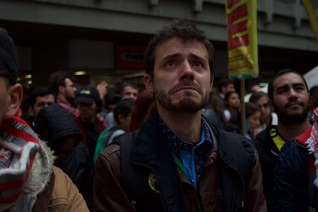 A Colombian man cries during a June 20 peace protest in Bogotá. 