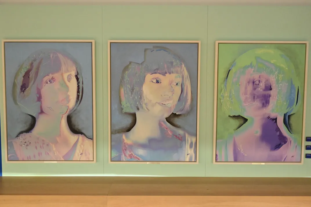 Three self-portraits created by Ai-Da