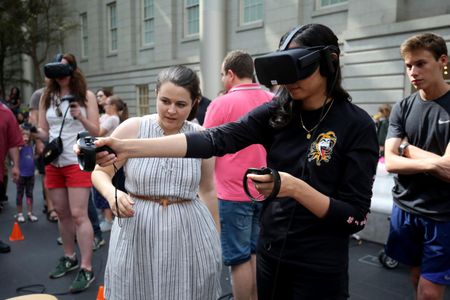 Testing out Virtual Reality at SAAM Arcade 2018. Photo by Libby Weiler.