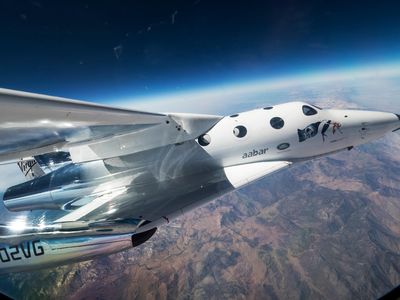 Spaceship Unity, carried by Virgin Galactic's mother ship and piloted by Mark Stucky and Dave Mackay, makes its first flight over the Mojave desert on September 8, 2016.