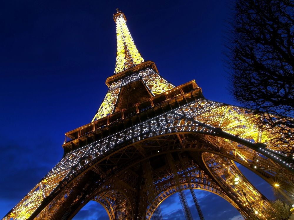 Wide Angle Of The Eiffel Tower At Sunset. The Longer Exposure Managed ...