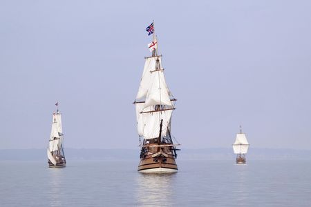 Replicas of English sailing ships on the James River — similar ships would have brought English colonists to Jamestown in 1607