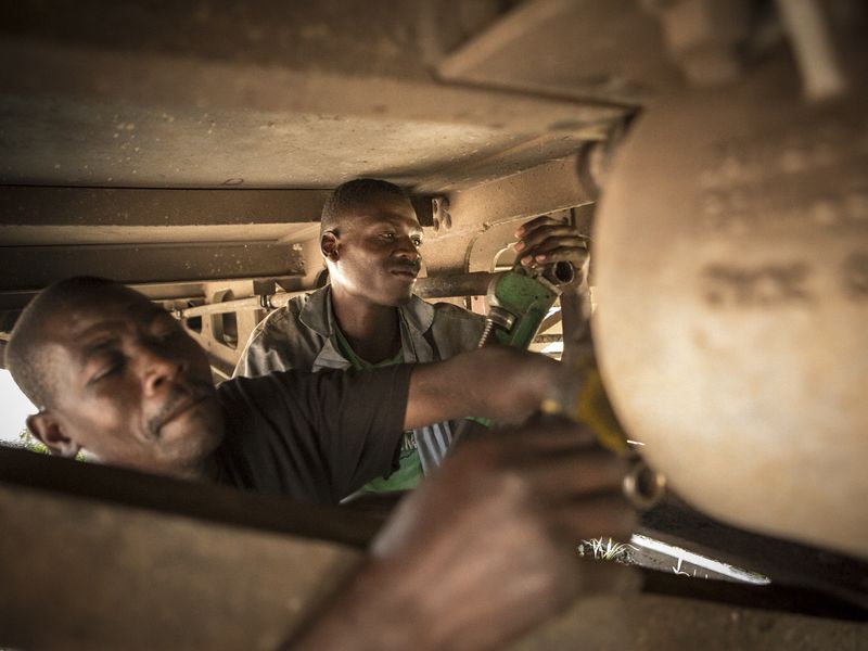 Two mechanics repairing the train Smithsonian Photo Contest