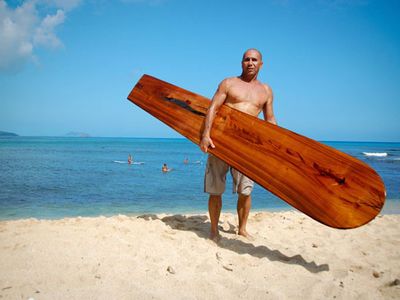Arist-in-Residence, Tom “Pohaku” Stone, a Native Hawaiian carver from O’ahu, Hawaii, will share his surfboard-carving skills this Sunday at the American Indian Museum.