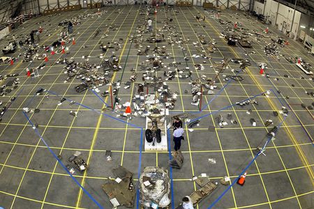 Debris from Columbia, arranged in place in a NASA hangar.