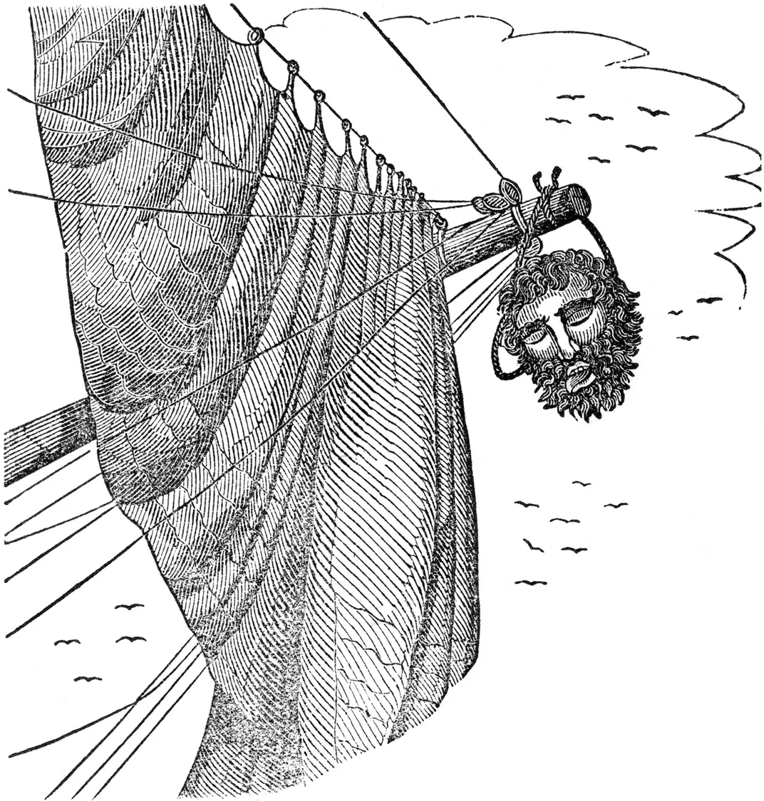 An illustration of Blackbeard's head, hanging from the bowsprit of a ship