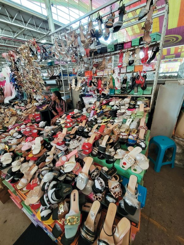 Many shoes at a market thumbnail