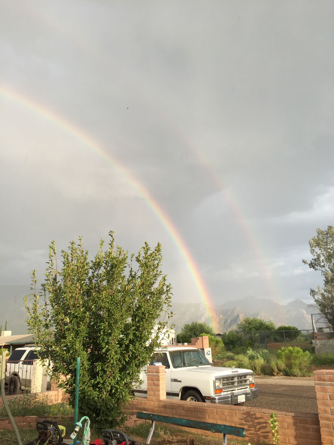 A double rainbow during monsoon season in Tucson, Arizona
