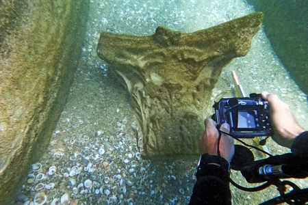 One of the marble capitals found by swimmer Gideon Harris
