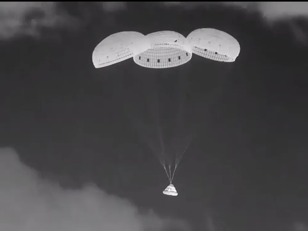 Calypso Starliner capsule with parachutes