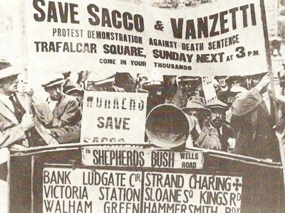 Sacco and Vanzetti were anarchists at a time when that movement was very different than it is today. 