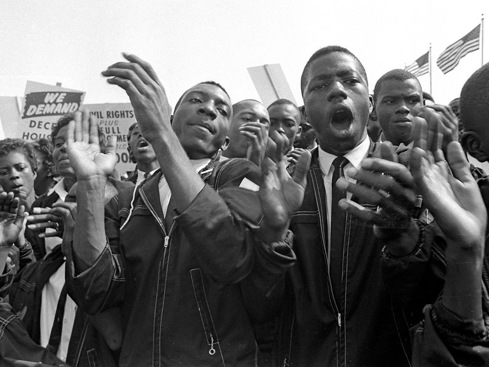 Protestors clap and chant at March on Washington