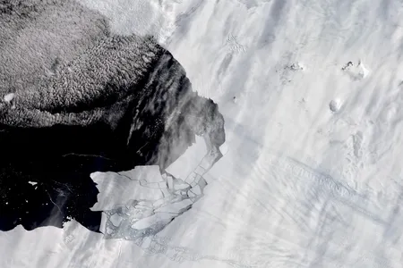 Icebergs breaking off of Pine Island Glacier into Pine Island Bay, where researchers found an uncharted island now named Sif.
