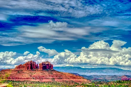 Iconic Cathedral Rock is just one example of the natural beauty found in Sedona, where iron oxide (or rust) stains the sandstone a vibrant red.